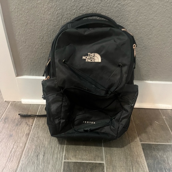 The North Face Bags North Face Black And Gold Backpack Poshmark